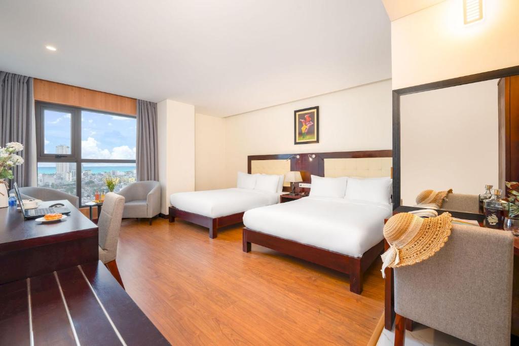 Deluxe Triple with Ocean & City View - BestBooking.vn